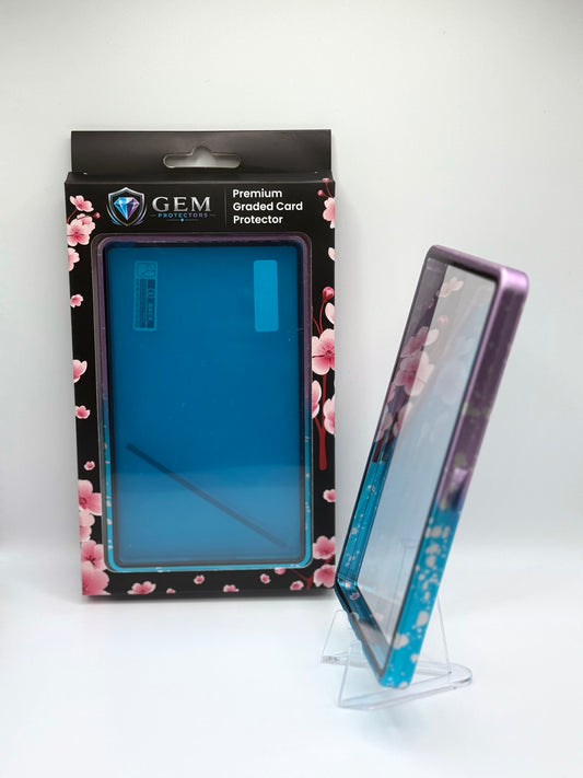 Blue & Purple Gem Protectors case angled on a clear stand to show the frame's side profile, next to its retail box