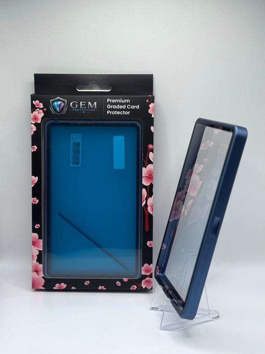 Cosmic Blue Gem Protectors case angled on a clear stand to show the frame's side profile, next to its retail box