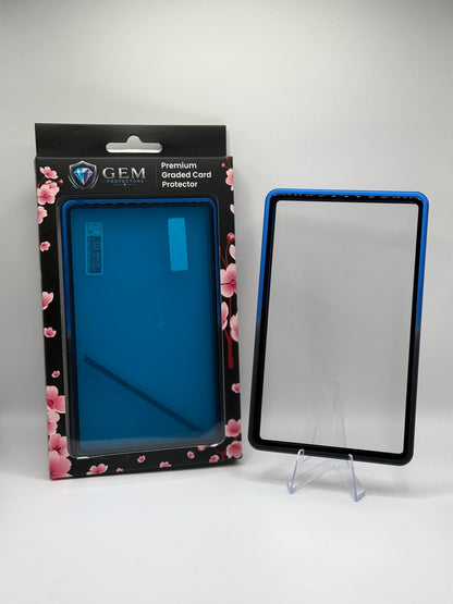Front view of the empty Black & Blue Gem Protectors case showing the frame and clear panel, beside its retail box