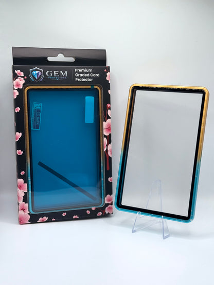 Front view of the empty Blue & Yellow Sparkle Gem Protectors case showing the frame and clear panel, beside its retail box