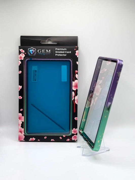 Cyan & Purple Sparkle Gem Protectors case angled on a clear stand to show the frame's side profile, next to its retail box