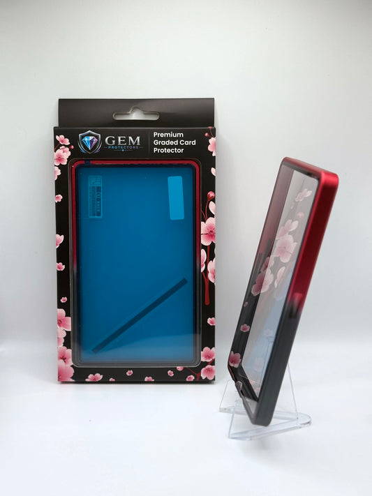 Black & Red Gem Protectors case angled on a clear stand to show the frame's side profile, next to its retail box